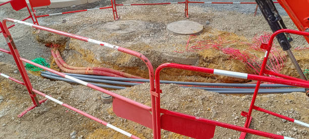 Chantier de travaux publics avec barrières de protection